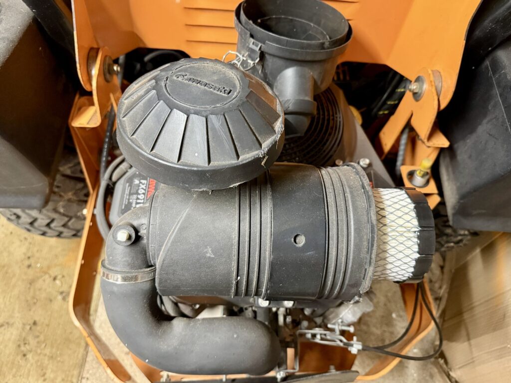 SCAG mower engine air filter inspected in the PGM workshop